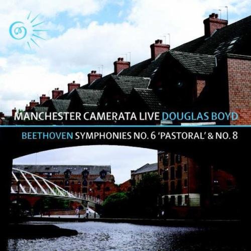 A CD cover featuring a serene canal scene with brick buildings and a bridge.
