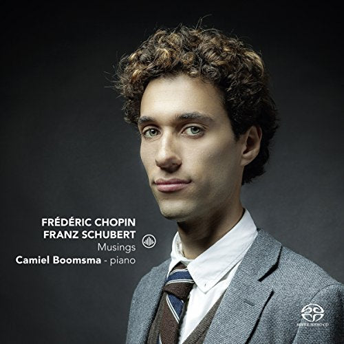A man in a grey suit and tie on a CD cover.