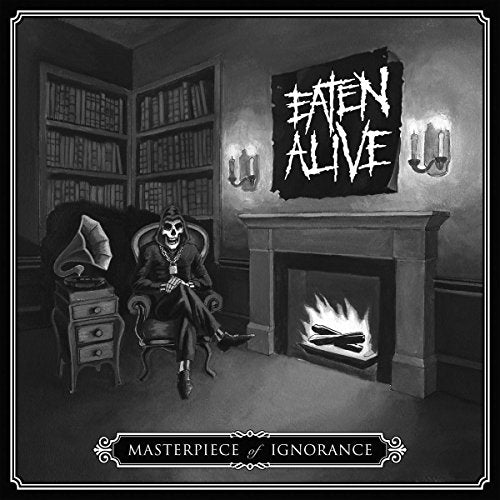 Skeleton in suit seated in a room with a fireplace and books.