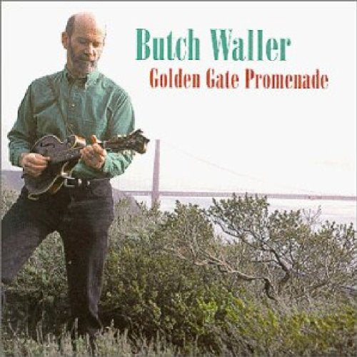 "CD cover featuring a man playing mandolin outdoors with a bridge in the background."