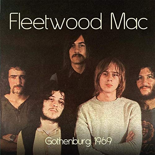"Fleetwood Mac album cover featuring a group portrait of five band members against a dark background."