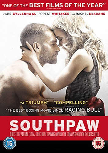 "DVD cover for 'Southpaw' featuring a man and woman in a close, emotional embrace."