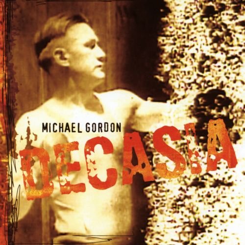 "Album cover with man in white shirt beside skulls, titled 'Decasia' by Michael Gordon."