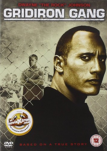 DVD cover for "Gridiron Gang" featuring Dwayne "The Rock" Johnson, with a man in front of a chain-link fence.