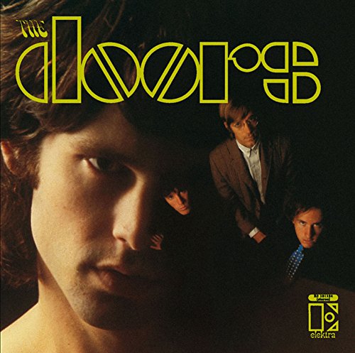 "Vinyl record with black cover featuring The Doors band members and yellow text."