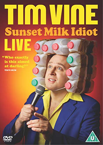DVD cover featuring Tim Vine wearing hair rollers, holding a microphone, against a red background.