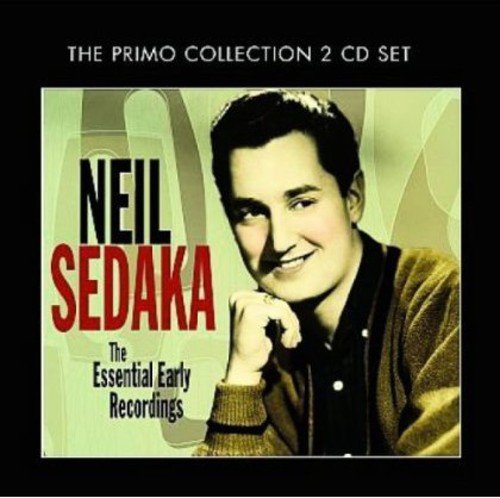 "CD cover with Neil Sedaka portrait, 'The Essential Early Recordings' text on black background."