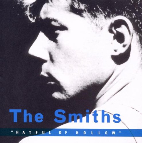 "Album cover with black and white photo of man, blue text 'The Smiths Hatful of Hollow'."