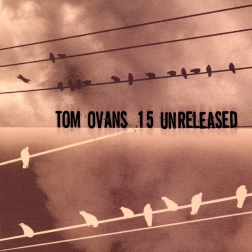 "Album cover with birds on power lines and cloudy sky, titled 'Tom Ovans - 15 Unreleased'."