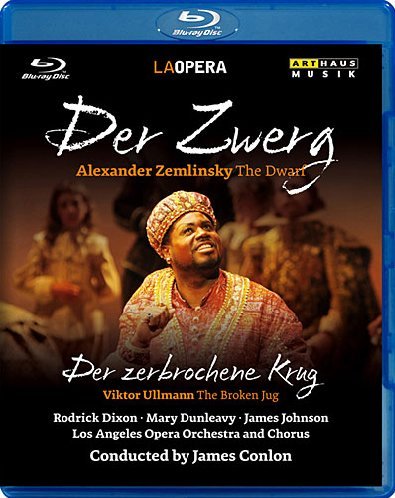 "Blu-ray case with a man in colorful attire singing, surrounded by blurred figures."