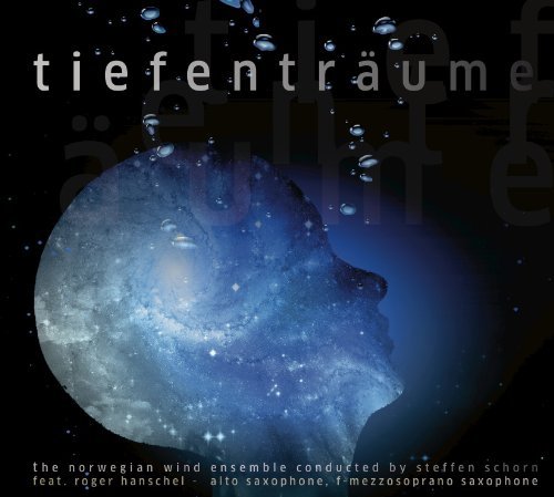 A blue-toned silhouette of a human head with a galaxy inside, surrounded by bubbles.