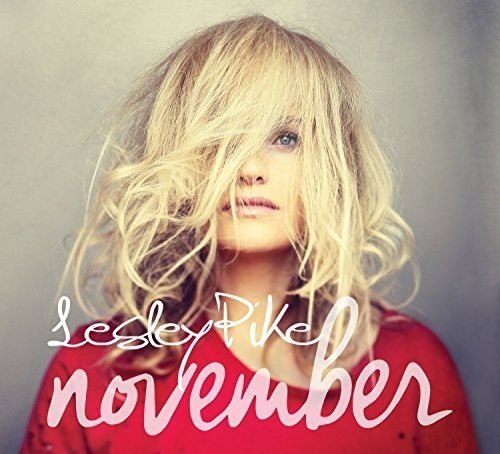 "Album cover featuring a woman with blonde hair and red shirt, text 'Lesley Pike november'."