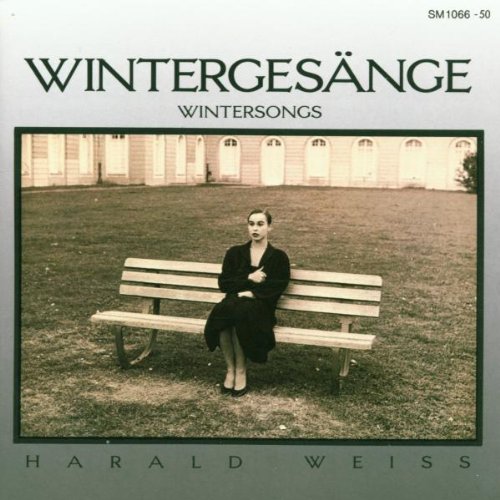 Album cover with a woman sitting on a bench in a grassy area.