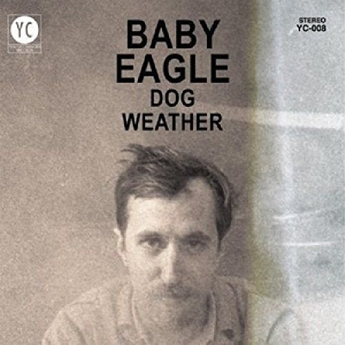 "Black and white vinyl album cover featuring a man with messy hair."