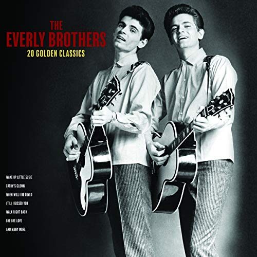 The Everly Brothers album cover featuring two men with guitars.