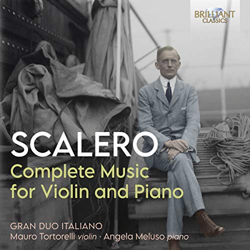 "CD cover with a man in a suit sitting on a ship's deck."