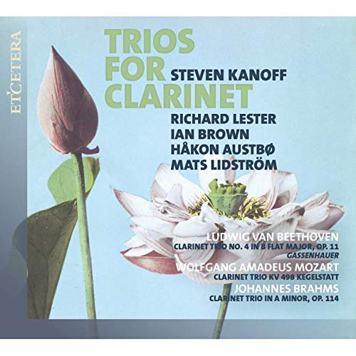 "CD cover with light blue background, flower image, and text listing musicians and composers."