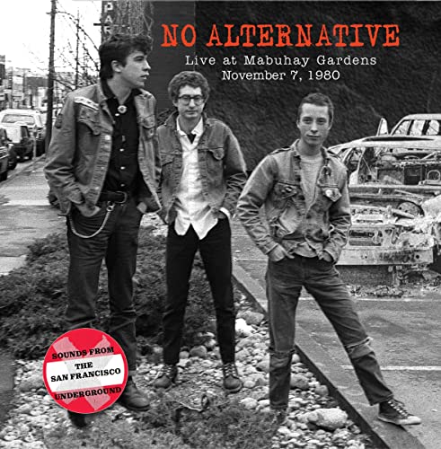 Black and white photo of three men in leather jackets standing outdoors.