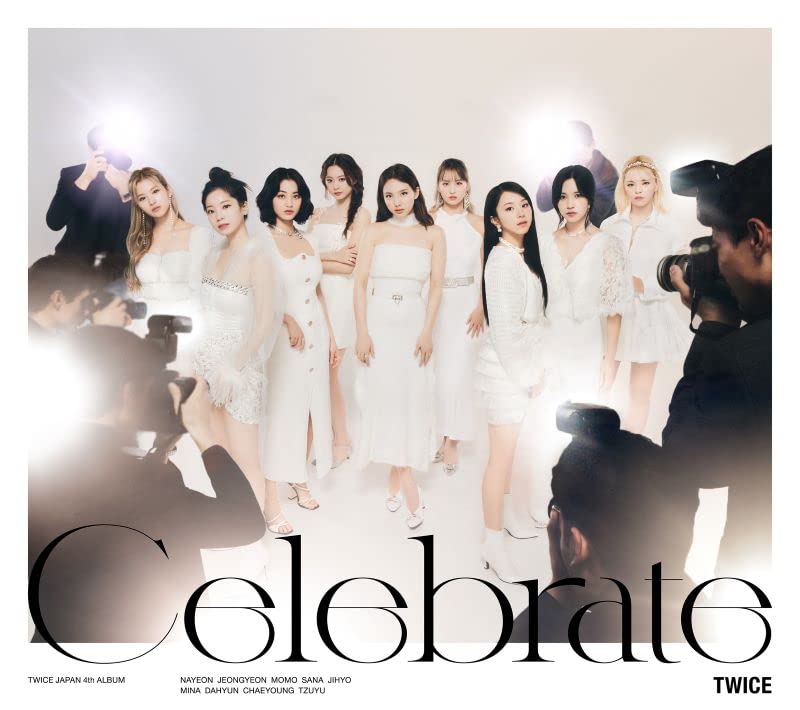 Nine women in white outfits pose with the word "Celebrate" below.