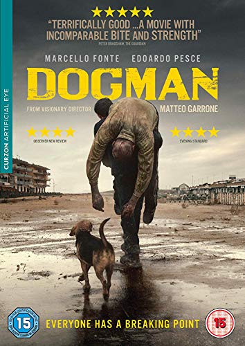 DVD cover for "Dogman" showing a man carrying another on his back, with a dog.