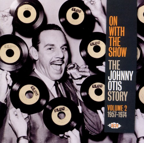 Johnny Otis portrait surrounded by vinyl records, album cover for "On With The Show".