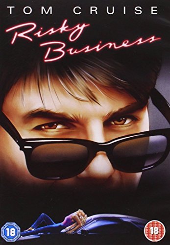 DVD cover featuring a close-up of Tom Cruise wearing sunglasses with neon-style movie title.