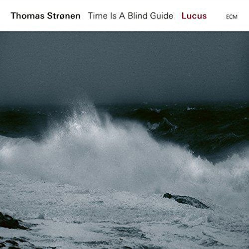 "Album cover featuring a turbulent ocean scene with crashing waves against a dark sky."