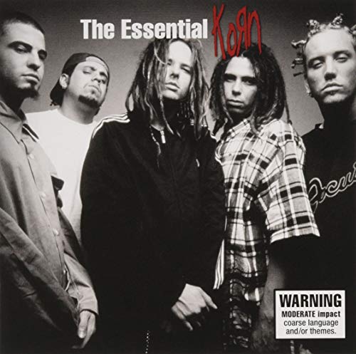 Black and white album cover featuring the band Korn, with a warning label.