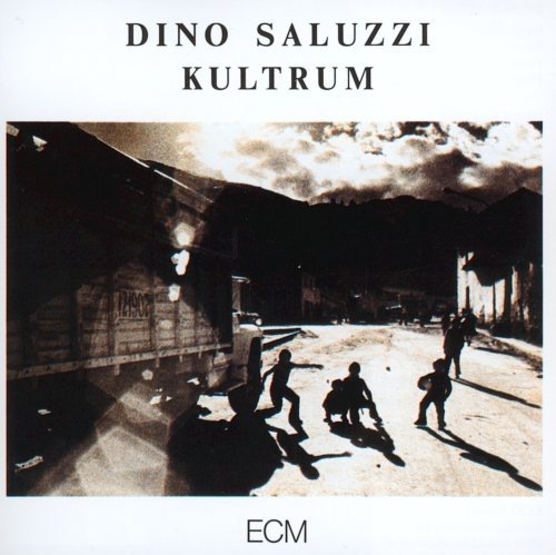 "Album cover with black and white image of people in a street scene."