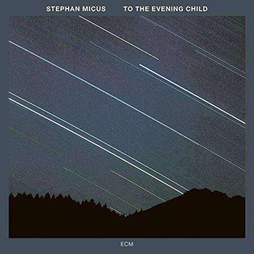 "Album cover with star trails over a dark landscape and 'ECM' at the bottom."