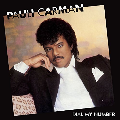 Pauli Carman album cover featuring a portrait of the artist in a suit.