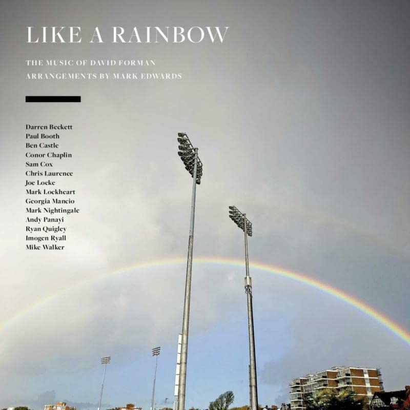 CD cover: "Like A Rainbow" with a landscape featuring stadium lights and a rainbow.