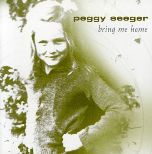 "CD cover with a faded green-toned image of a smiling woman outdoors."