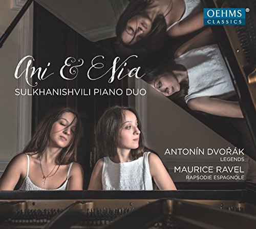 CD cover featuring two women sitting at a piano, wearing white dresses.