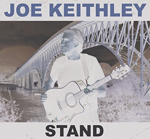 Joe Keithley album cover: man with guitar in front of a bridge.