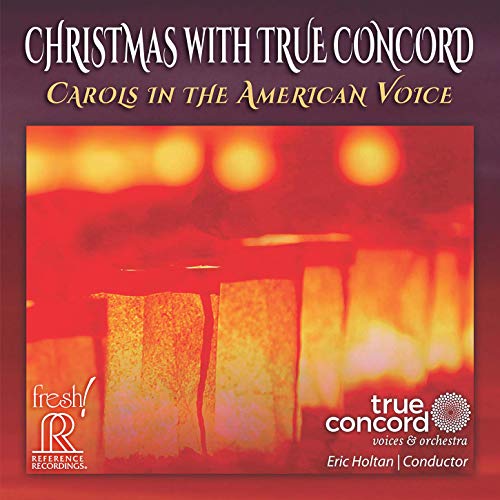 "Christmas album cover with blurred candles and red background, featuring title and artist information."