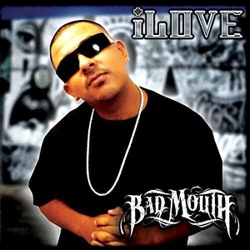 Compact disc cover featuring a man in black sunglasses and a black shirt.