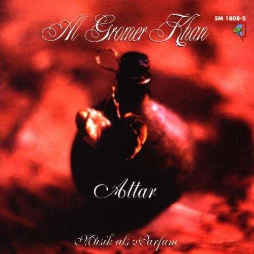 "CD cover with a dark bottle on a red background, ornate white text."