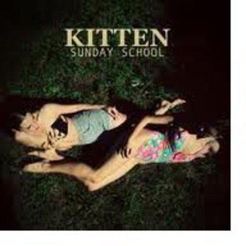 "Album cover for 'Kitten - Sunday School' showing two women lying on grass."