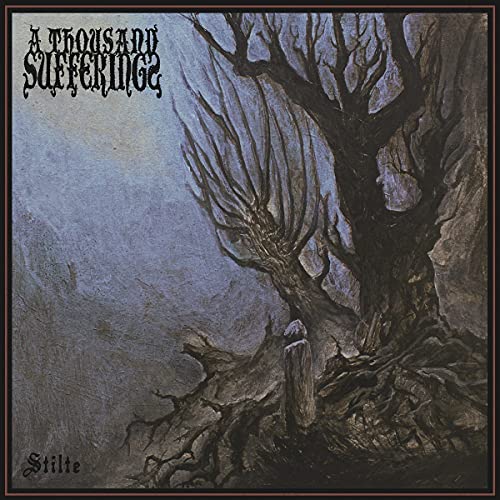 CD cover: dark, textured landscape with a bare tree and band name.