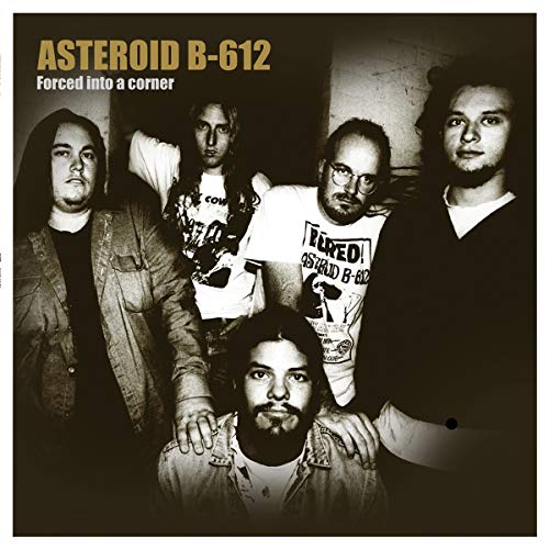 "Black and white vinyl album cover with a group of five men posing together."