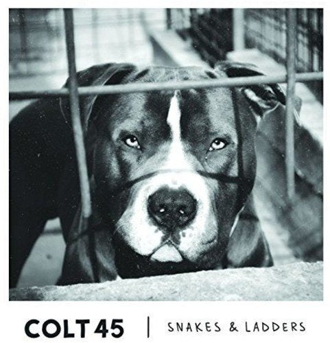 Black and white album cover featuring a dog behind metal bars, with text below.