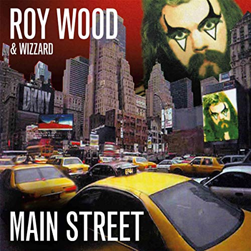 Album cover featuring a city street scene with yellow taxis and a man's face.