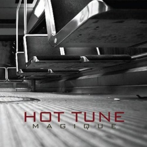 "Black and white image of a CD player with 'Hot Tune Magique' text."
