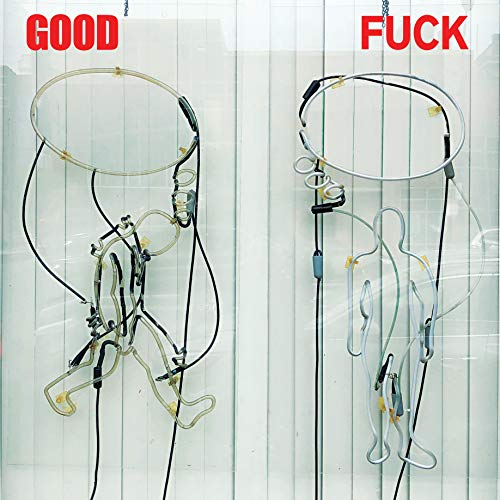CD cover with two neon light sculptures resembling medical devices.