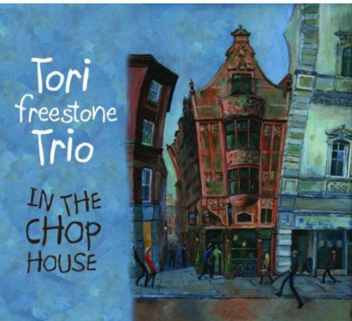 "Album cover art for Tori Freestone Trio, featuring a watercolor painting of a street scene."