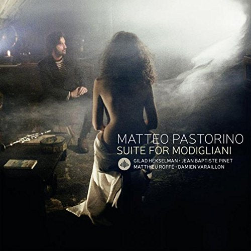 A CD cover featuring a man and a woman in a dimly lit, smoky room.