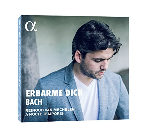CD cover featuring a man in a grey jacket, looking down, with white text.