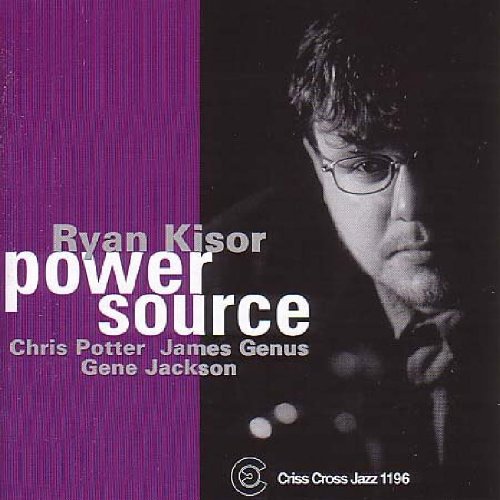 "Album cover with a man's portrait, purple background, and white text."