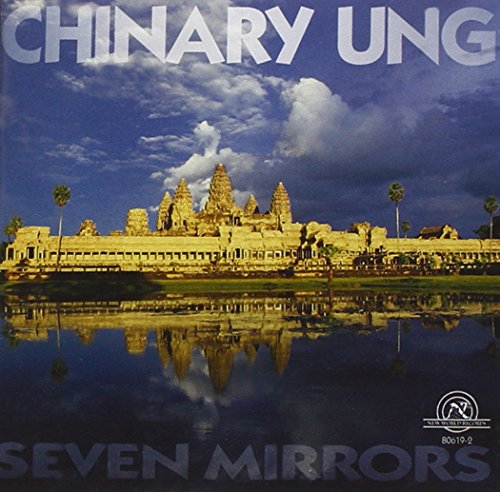 "Album cover featuring an ancient temple reflected in water, with cloudy blue sky."
